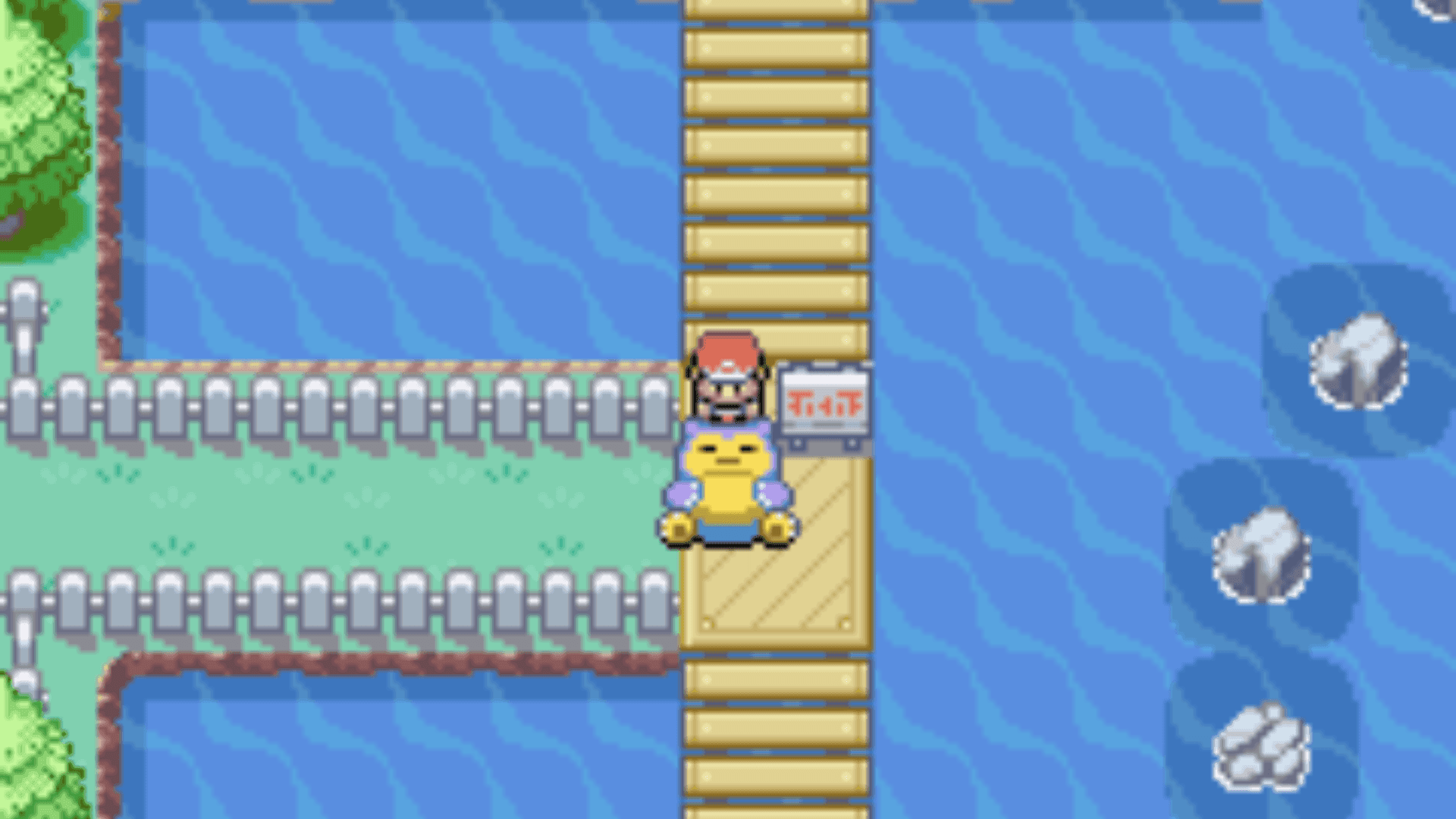 Snorlax sleeping across a bridge over water in Pokémon FireRed